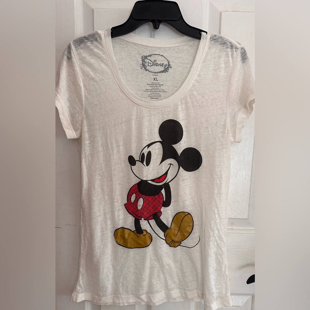 Vintage Disney white graphic tee. Gold shoes and plaid shorts